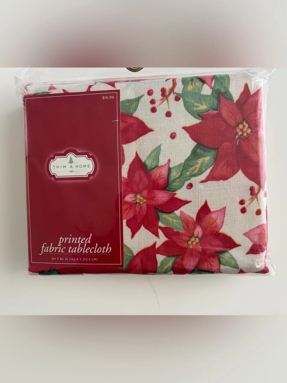 NWT Christmas print fabric tablecloth. 60x84 oblong. Original packaging